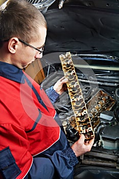 Machanic repairman at automobile car engine repair