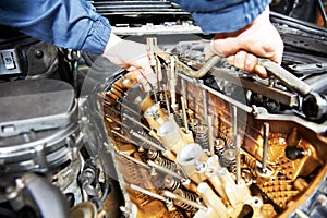 Machanic repairman at automobile car engine repair