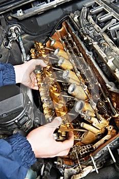 Machanic repairman at automobile car engine repair