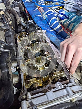 Machanic repairman at automobile car engine repair