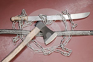 Machete, chain, ax and belt with metal inserts-an attribute of a metal player.