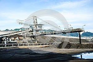 Machine in coal stock pile