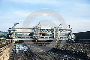 Machine in coal stock pile