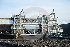 Machine in coal stock pile