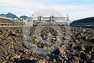 Machine in coal stock pile