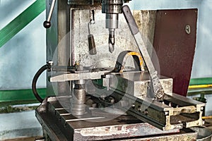 Machine for drilling metal products. The concept of the metalworking industry. Workshop for the production of tools