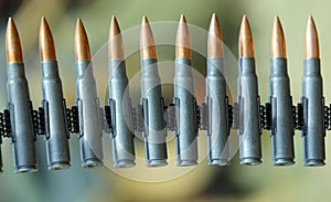 Machine gun bullets during a war patrol of the army photo