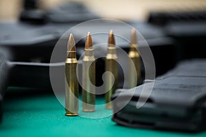 Machine gun cartridges and ammunition on the range.