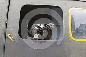 Machine gun at helicopter photo