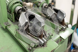 Machine for inserting backdrops. Shoe production