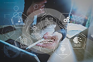 Website designer working digital tablet dock keyboard and computer laptop with smart phone and graphics design diagram on mable d