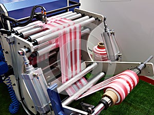 Machine for manufacturing plastic bags