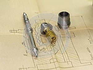 Machine parts and drawing.