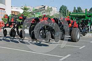 Machine plough on parking lot photo