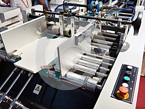 Machine for production of cardboard packaging boxes