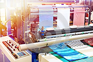 Machine for production of plastic bags