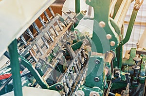 Machine for stitching sheets of paper in the printing. Magazine, brochure, book. Production of printed products. Vintage