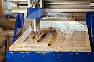 Machine tool in wood factory with drilling cnc machines. Computer numerical control