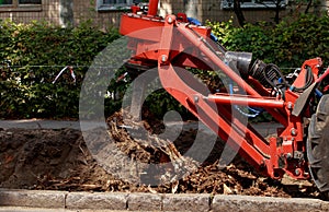 Machine for uprooting stumps