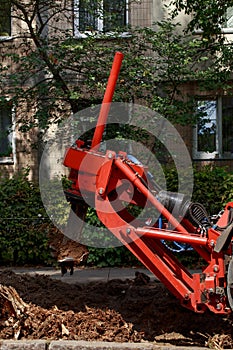Machine for uprooting stumps