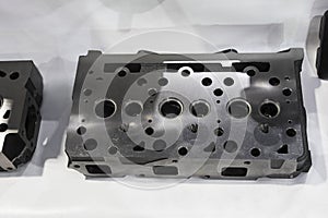 machined head cylinder from iron casting ; close up