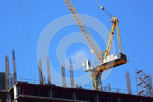 Machinery crane working in construction site building