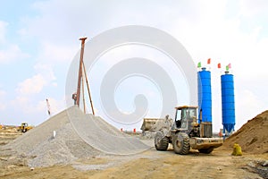 Machinery and equipment in a building materials storage site