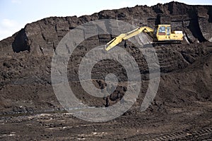 Machinery on a mound of peat in Somerset,UK
