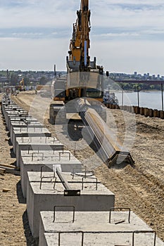 Machinery on revetment construction site