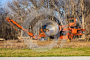 Machinery for turning trees into mulch
