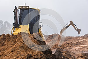 Machines excavating the soil from the beginning of the work.