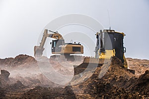 Machines excavating the soil from the beginning of the work;