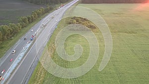 Machines operate at highway repair at rural site aerial view