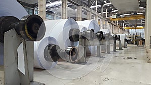 Machines for the production of paper rolls
