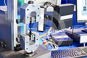 Machines for testing metal for tensile