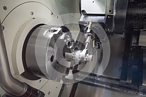 Machining automotive part by cnc turning machine