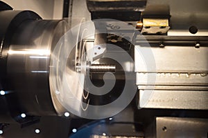 Machining automotive part by cnc turning machine