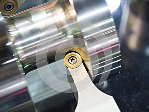 Machining automotive part by cnc turning machine