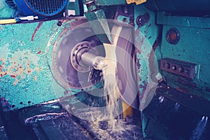Machining of the internal hole on a coordinate grinding machine with sparks, in an industrial plant.