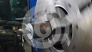 Machining shaft on lathe. metalworking machine. Cutting metal processing technology. CNC Milling Machine Produces Metal