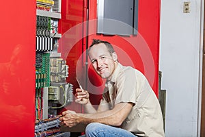 Machinist worker technicians at work adjusting