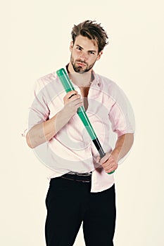 Macho or gangster with sports equipment. Man with confident face isolated on white background.