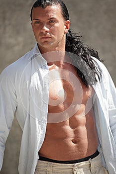 Macho man with shirt unbuttoned photo