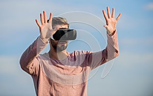 Macho man wear wireless VR glasses. Enjoying new experience. Digital future and innovation. guy virtual reality goggles