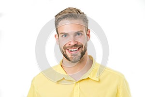 Macho with perfect smile on unshaven face isolated on white background. Happy man with beard. Bearded and handsome. Skin