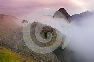 Machu Picchu, Cusco, Peru in the morning mist, found on the steep slopes of the Andes Mountains