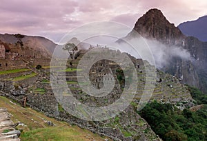 Machu Picchu, Cusco, Peru in the morning mist, found on the steep slopes of the Andes Mountains