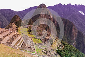 Machu Picchu, Cusco, Peru in the morning mist, found on the steep slopes of the Andes Mountains