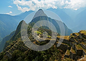 Machu Picchu, Cusco region, Peru: Overview of agriculture terraces, Wayna Picchu and surrounding mountains in the background,