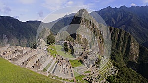 Machu Picchu ruins and terraces view from above, on a sunny